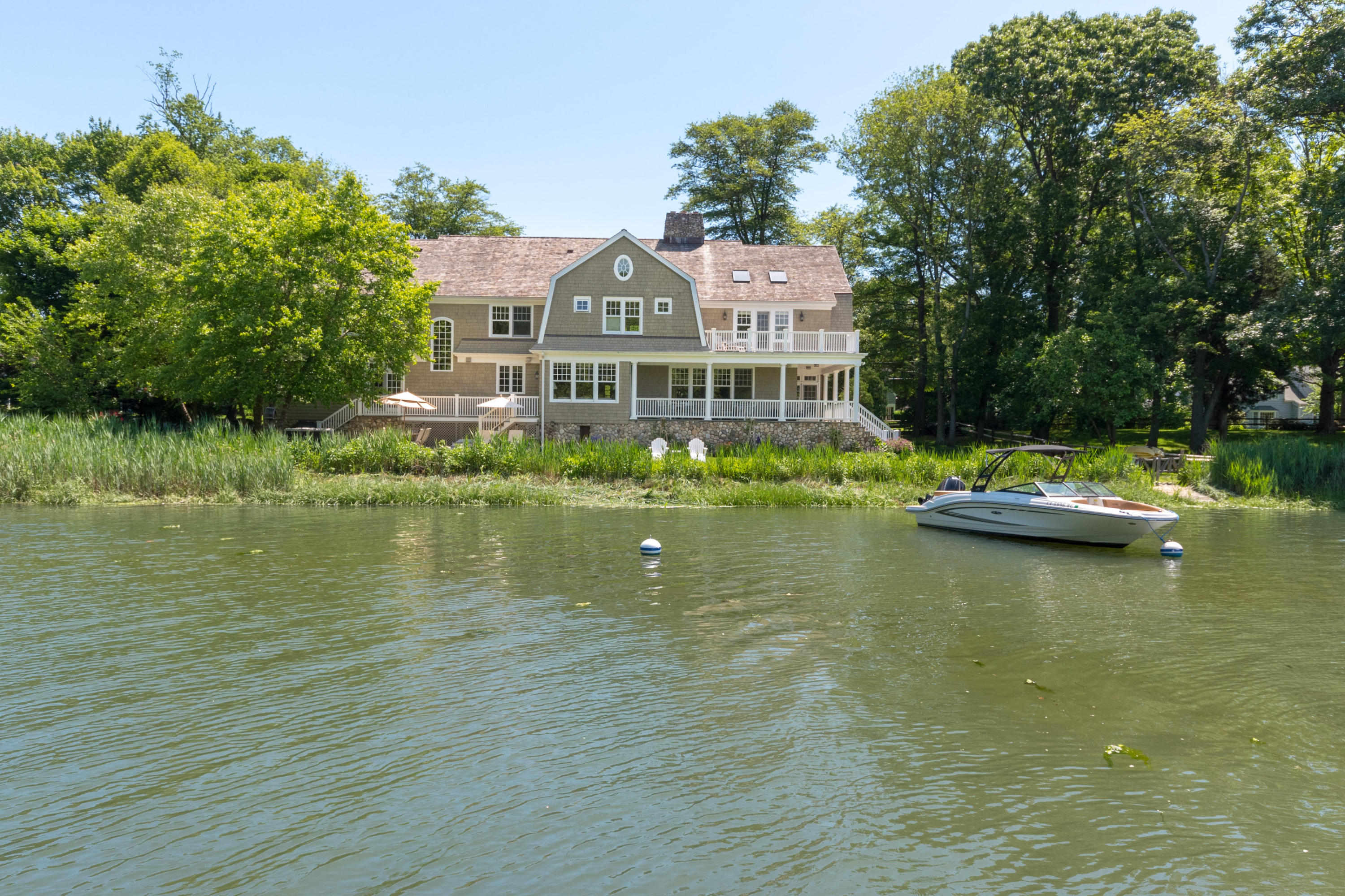 15 Seagate Road Darien, CT 06820 - Photo 38 of 48 a view of a lake with houses