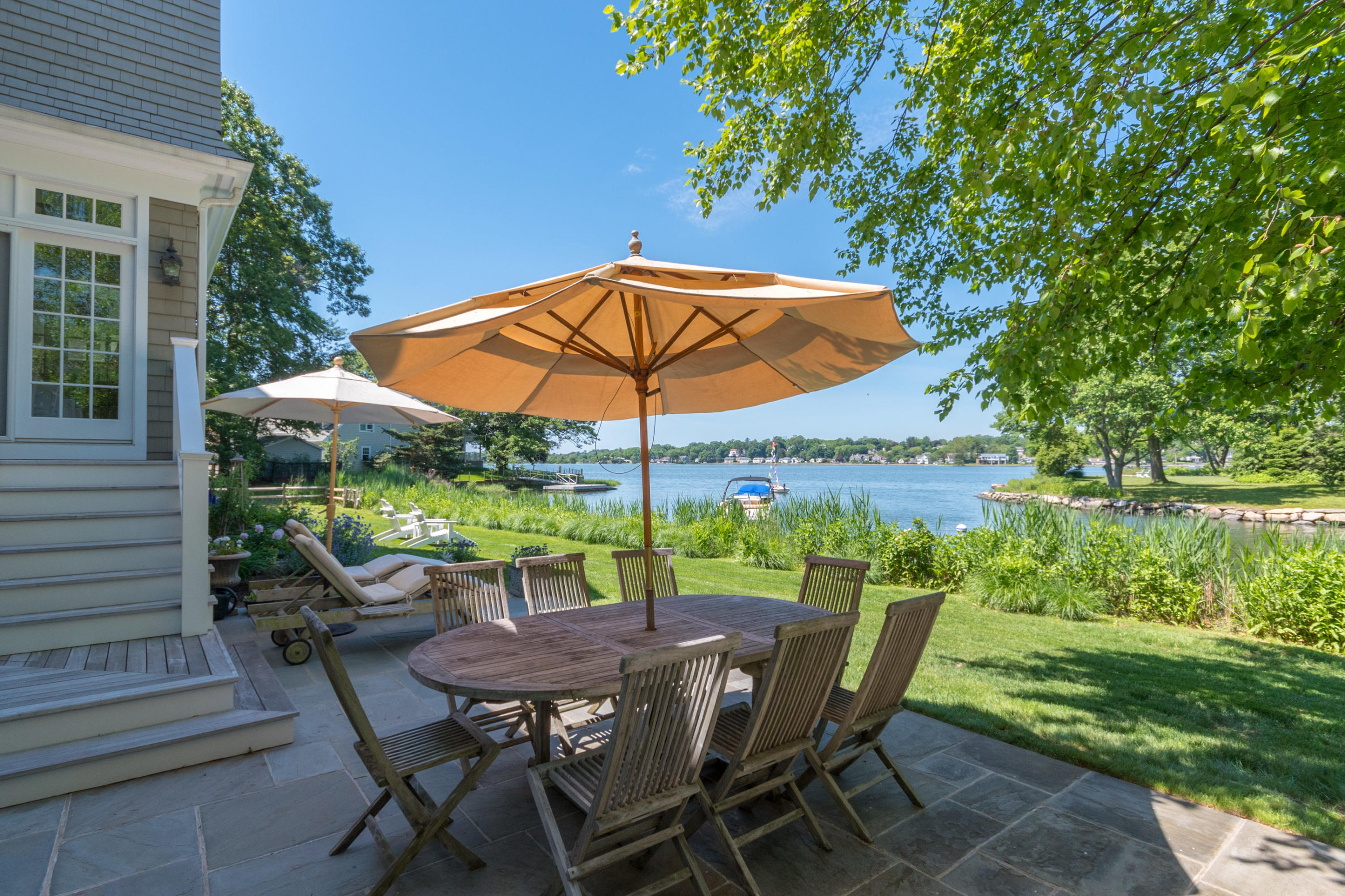 15 Seagate Road Darien, CT 06820 - Photo 43 of 48 a view of an outdoor sitting area with furniture and backyard