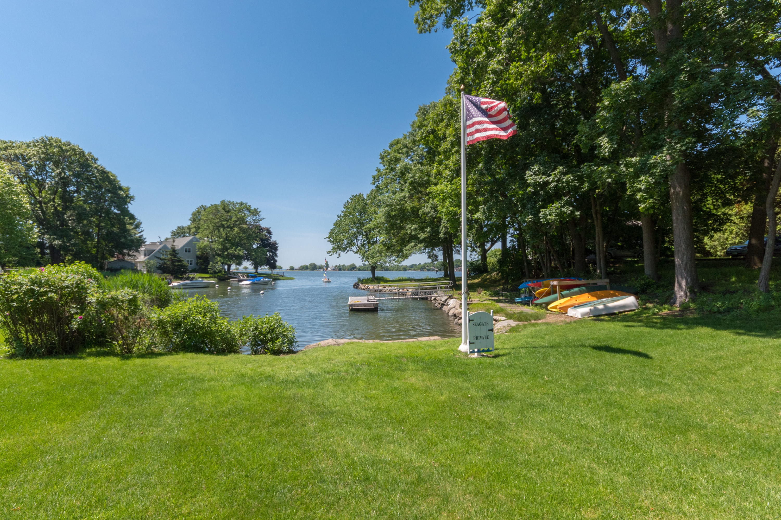 15 Seagate Road Darien, CT 06820 - Photo 44 of 48 a view of a park with swings and slides