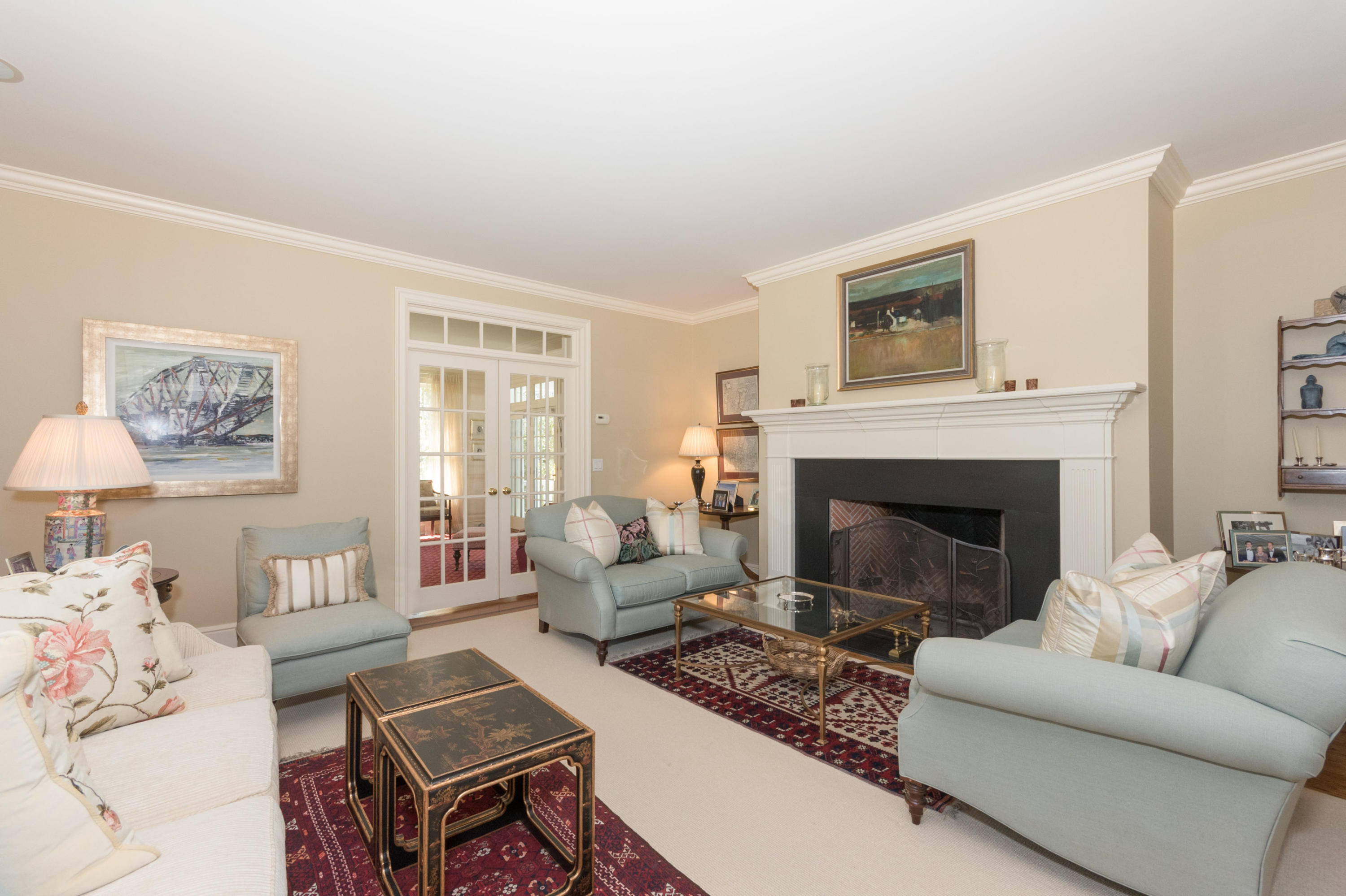 15 Seagate Road Darien, CT 06820 - Photo 10 of 48 a living room with furniture and a fireplace