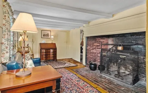 a living room with fireplace