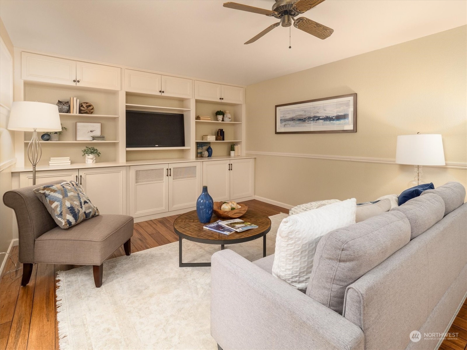 1622 243rd Place Southeast Bothell, WA 98021 - Photo 14 of 25 a living room with furniture and a flat screen tv