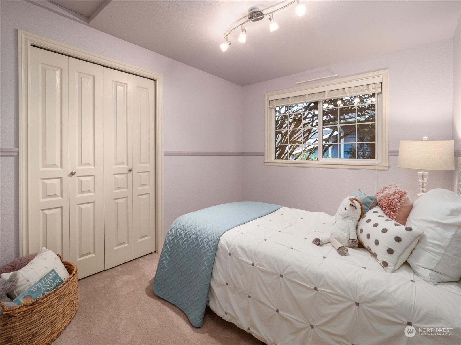 1622 243rd Place Southeast Bothell, WA 98021 - Photo 18 of 25 a bedroom with a bed and a window