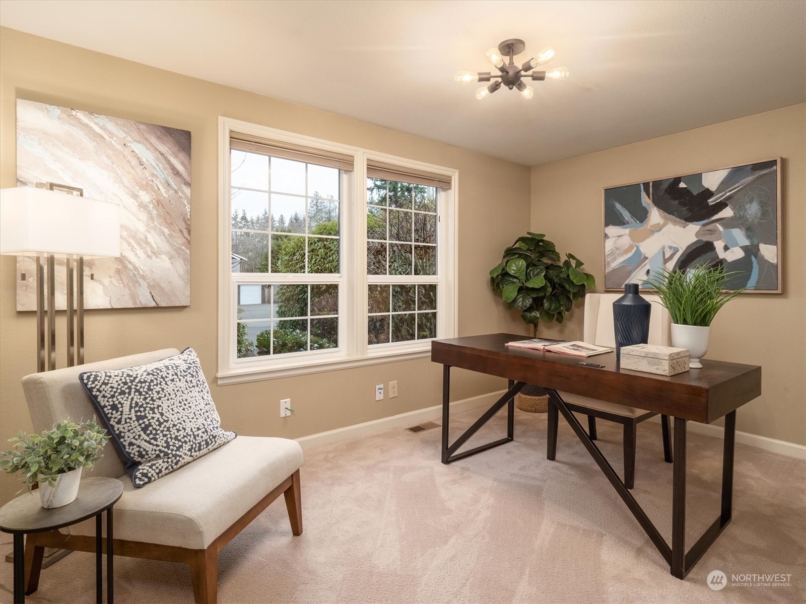 1622 243rd Place Southeast Bothell, WA 98021 - Photo 19 of 25 a living room with furniture a table and a large window