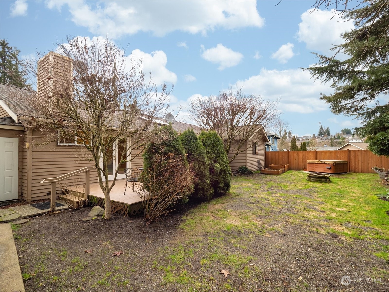 1622 243rd Place Southeast Bothell, WA 98021 - Photo 25 of 25 a view of a house with a yard