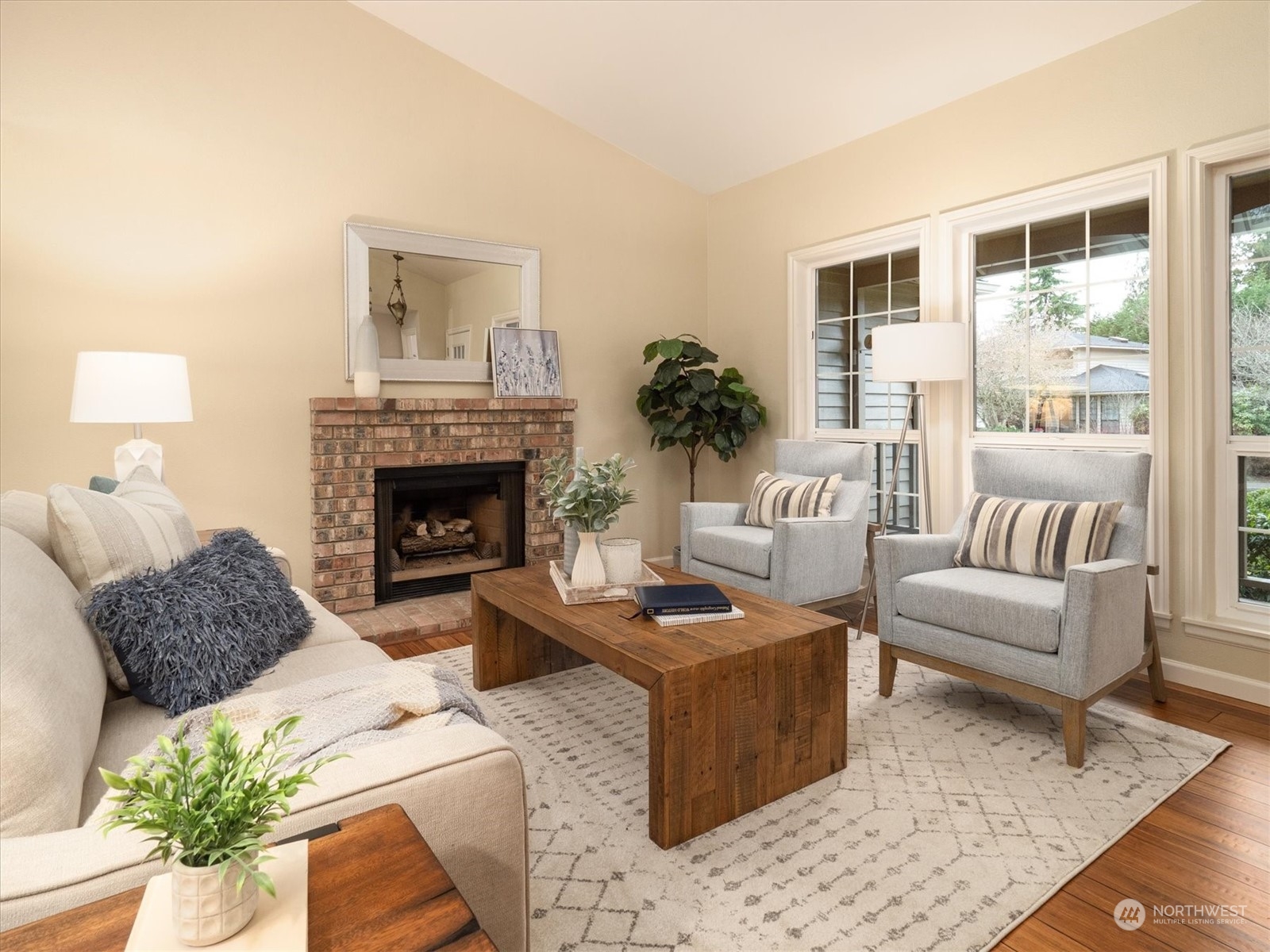 1622 243rd Place Southeast Bothell, WA 98021 - Photo 5 of 25 a living room with furniture and a fireplace