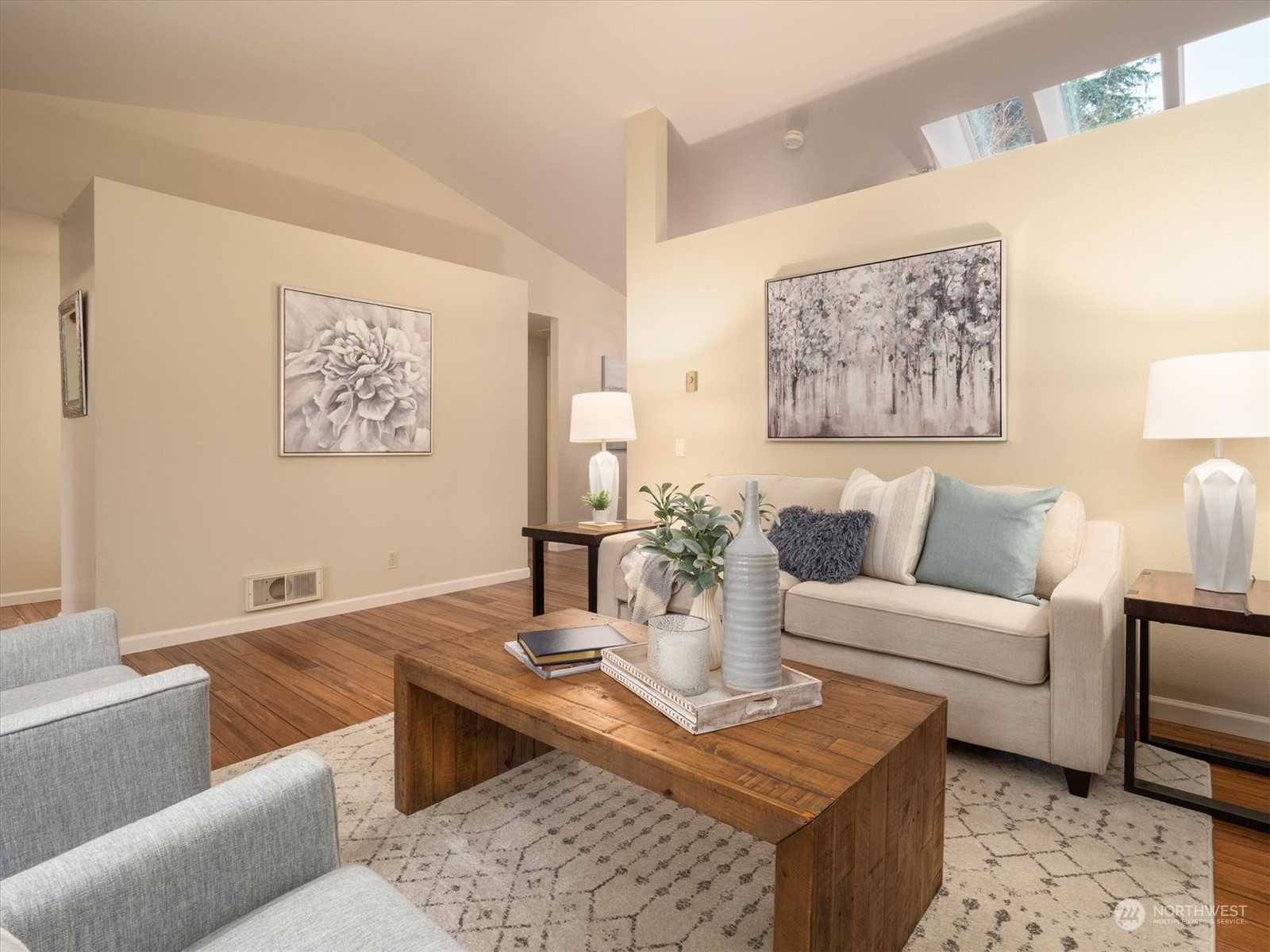 1622 243rd Place Southeast Bothell, WA 98021 - Photo 6 of 25 a living room with furniture a rug and a table