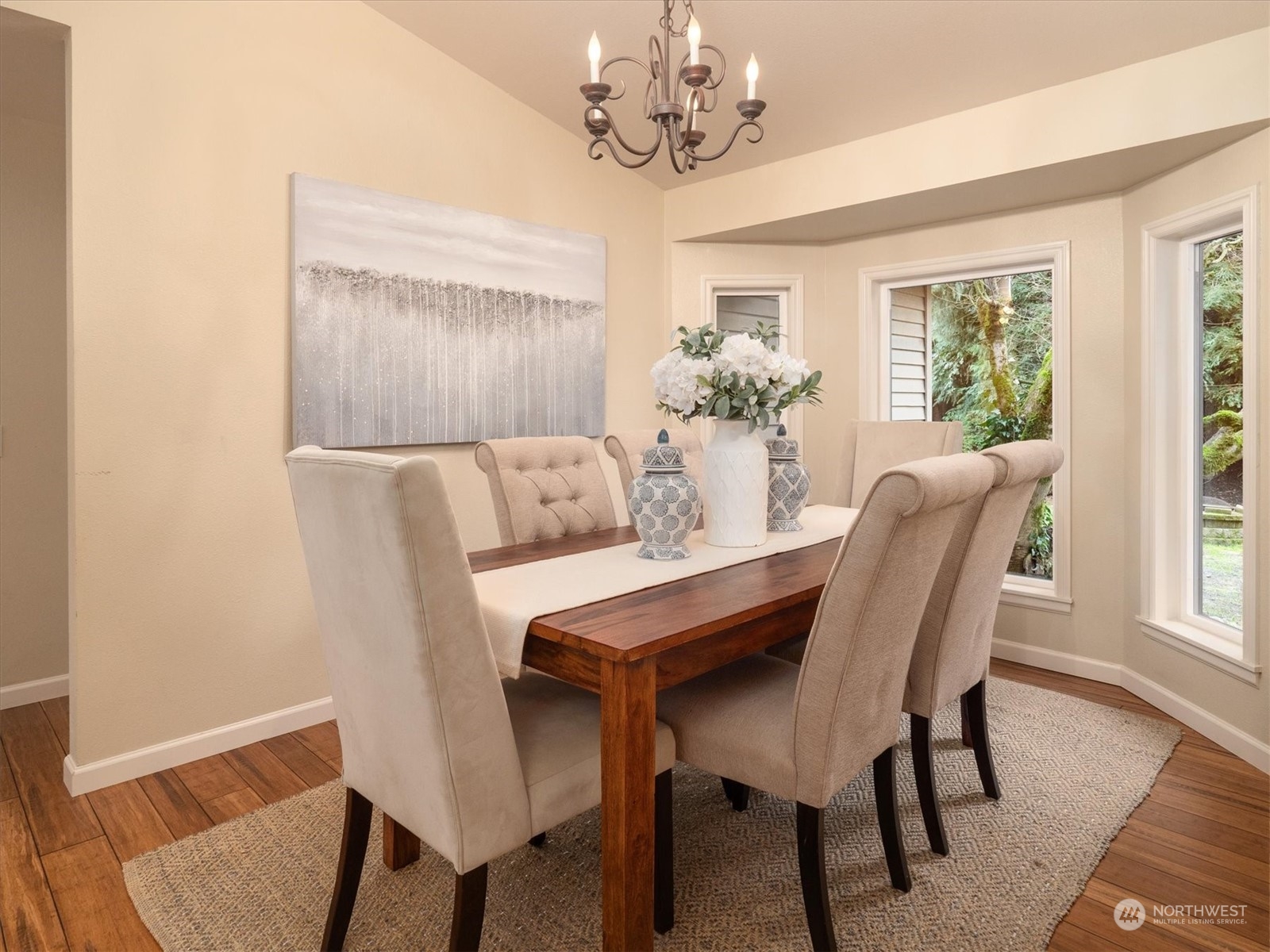 1622 243rd Place Southeast Bothell, WA 98021 - Photo 7 of 25 a view of a dining room with furniture window and wooden floor