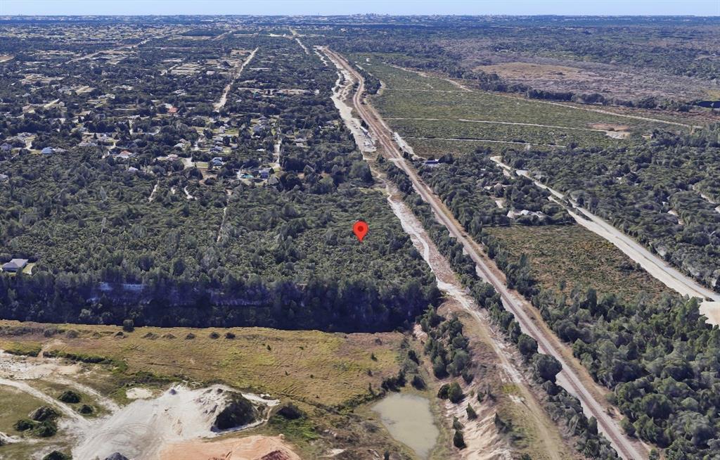 0 Riegel Paper Orange City, FL 32763 - Photo 7 of 9 a view of a backyard with wooden fence