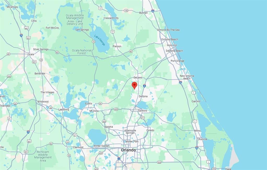 0 Riegel Paper Orange City, FL 32763 - Photo 9 of 9 a white and yellow sitting in a backyard