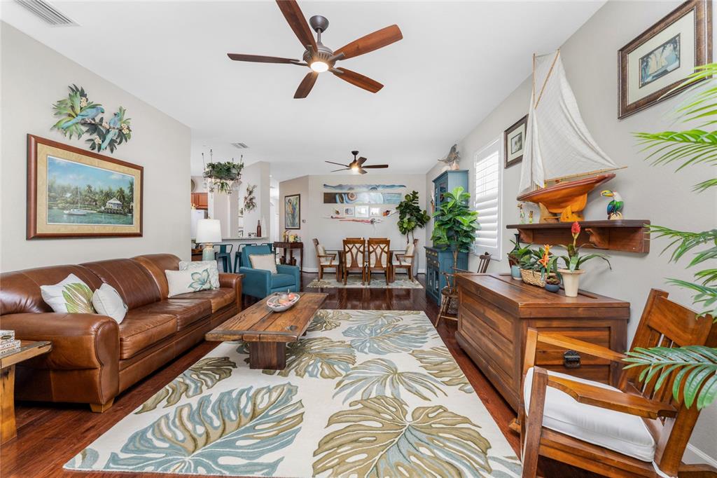 17094 Acapulco Road, Unit 321 Punta Gorda, FL 33955 - Photo 13 of 52 a living room with furniture and a large window