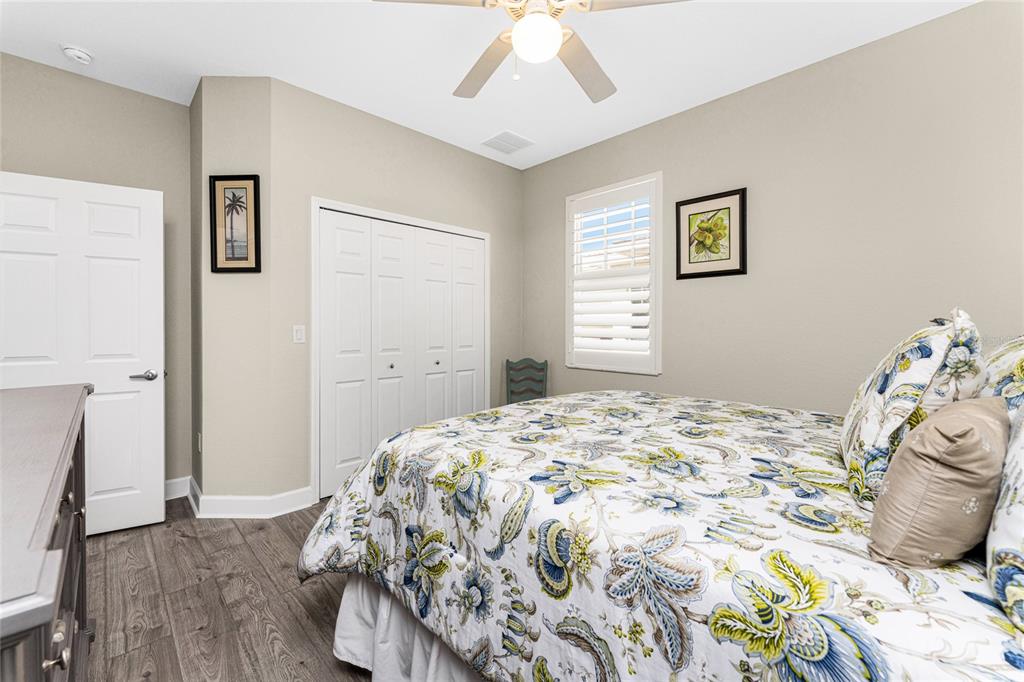 17094 Acapulco Road, Unit 321 Punta Gorda, FL 33955 - Photo 31 of 52 a bedroom with a bed and a window