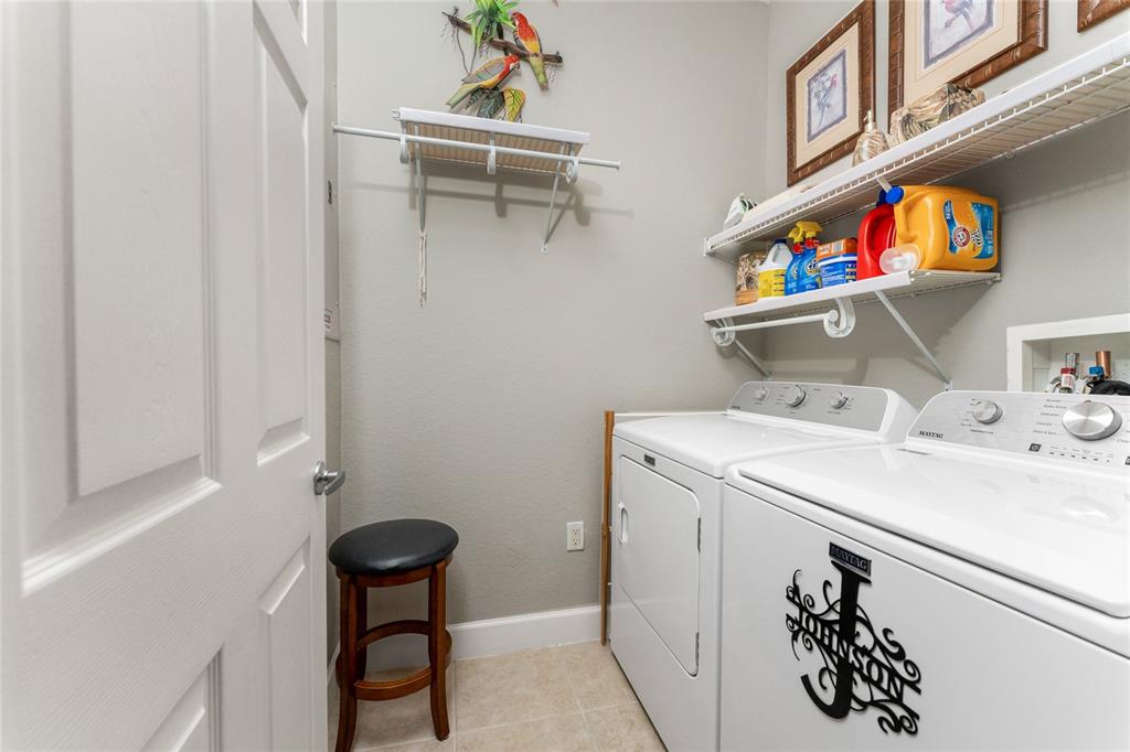 17094 Acapulco Road, Unit 321 Punta Gorda, FL 33955 - Photo 38 of 52 a utility room with dryer and washer