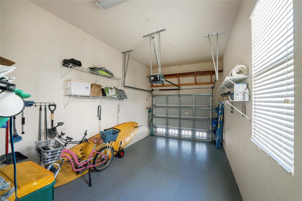 17094 Acapulco Road, Unit 321 Punta Gorda, FL 33955 - Photo 39 of 52 a view of a room with lots of furniture and wooden floor