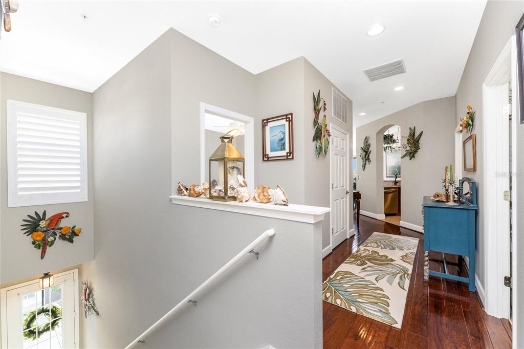 17094 Acapulco Road, Unit 321 Punta Gorda, FL 33955 - Photo 6 of 52 a living room with furniture and a wooden floor
