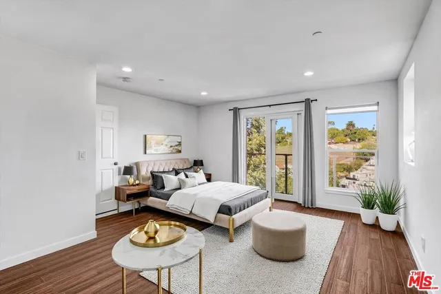 a view of bathroom with wooden floor