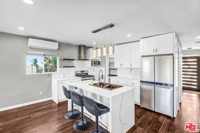a view of a balcony with chairs