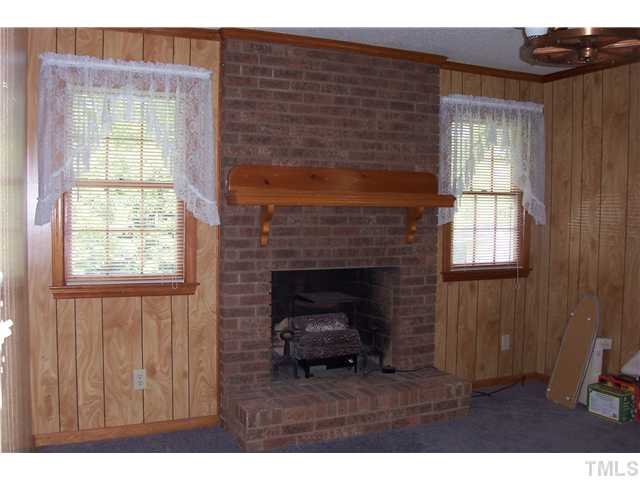 2014 Guy Road Angier, NC 27501 - Photo 17 of 17 Den windows look out to the rear yard