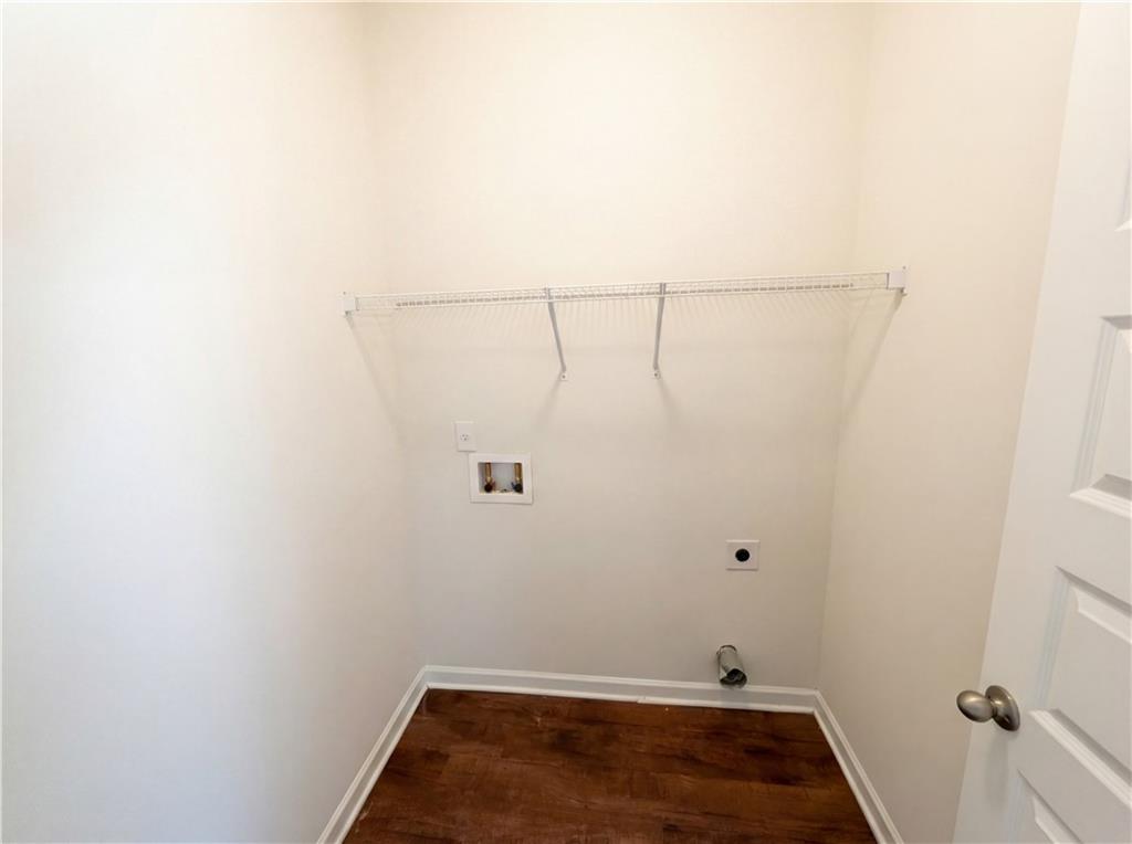 1209 Vienna Court Hampton, GA 30228 - Photo 11 of 21 a view of a room with racks on the wall