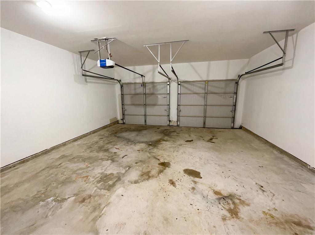 1209 Vienna Court Hampton, GA 30228 - Photo 19 of 21 a view of a garage