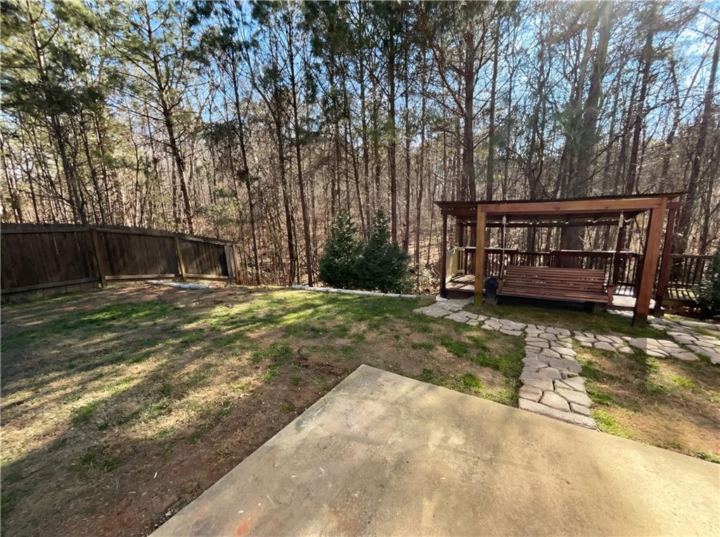 1209 Vienna Court Hampton, GA 30228 - Photo 20 of 21 a view of a backyard with swimming pool