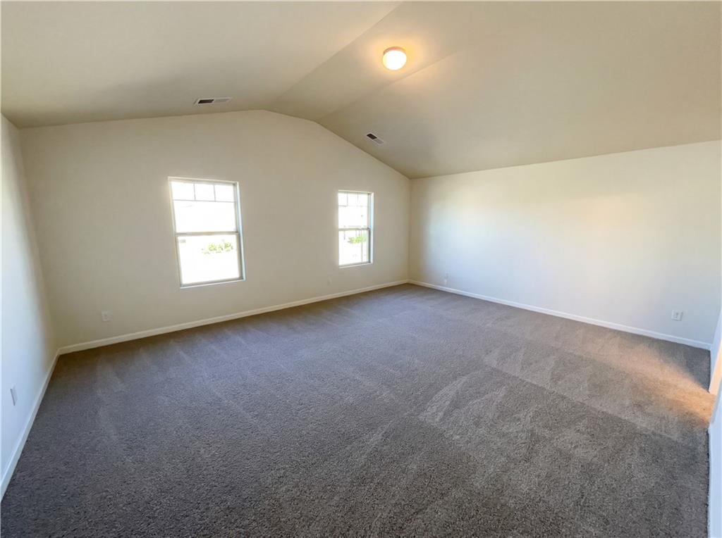 1209 Vienna Court Hampton, GA 30228 - Photo 4 of 21 an empty room with windows