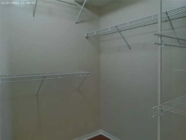 a view of a room with racks on the wall