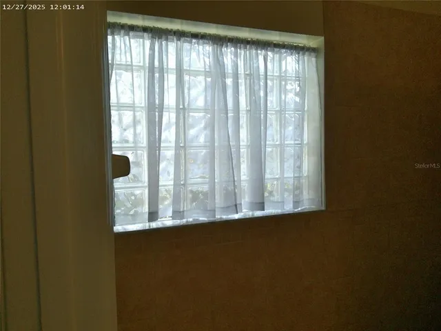 a view of a small space with a window