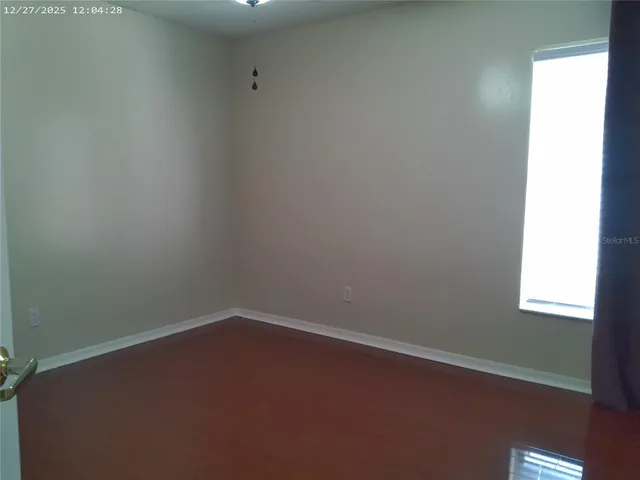 a view of a livingroom from a hallway