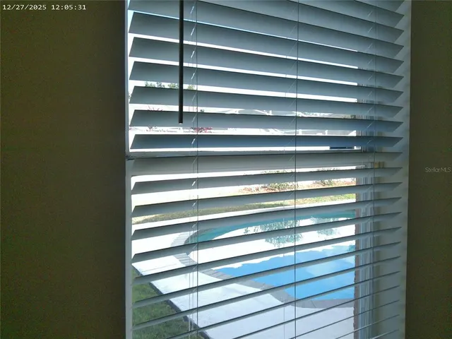 a view of elevator with hallway