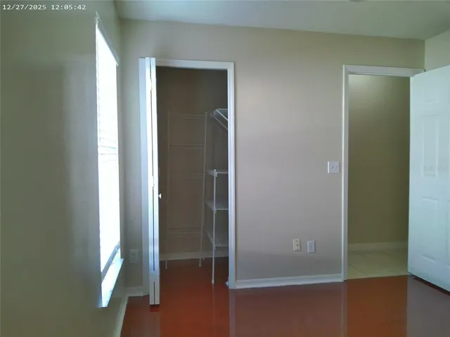 a bathroom with a toilet and a bathtub
