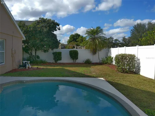 a view of a yard in front of house