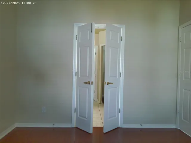 a view of front door with hallway