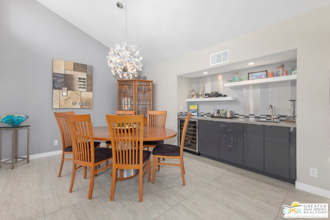 36022 Paseo Circulo West Cathedral City, CA 92234 - Photo 13 of 47 a dining room with furniture and window