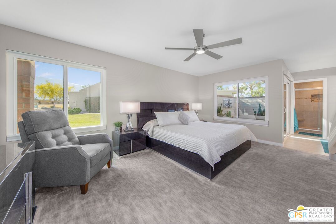36022 Paseo Circulo West Cathedral City, CA 92234 - Photo 18 of 47 a bedroom with a bed and a couch
