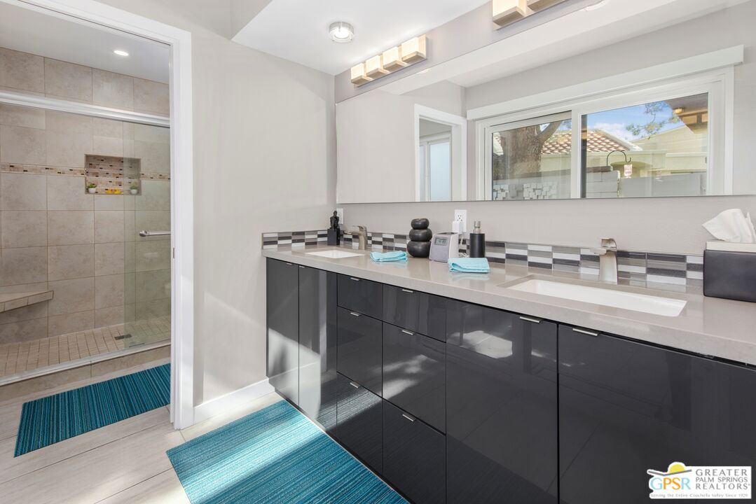 36022 Paseo Circulo West Cathedral City, CA 92234 - Photo 21 of 47 a bathroom with a sink and a mirror