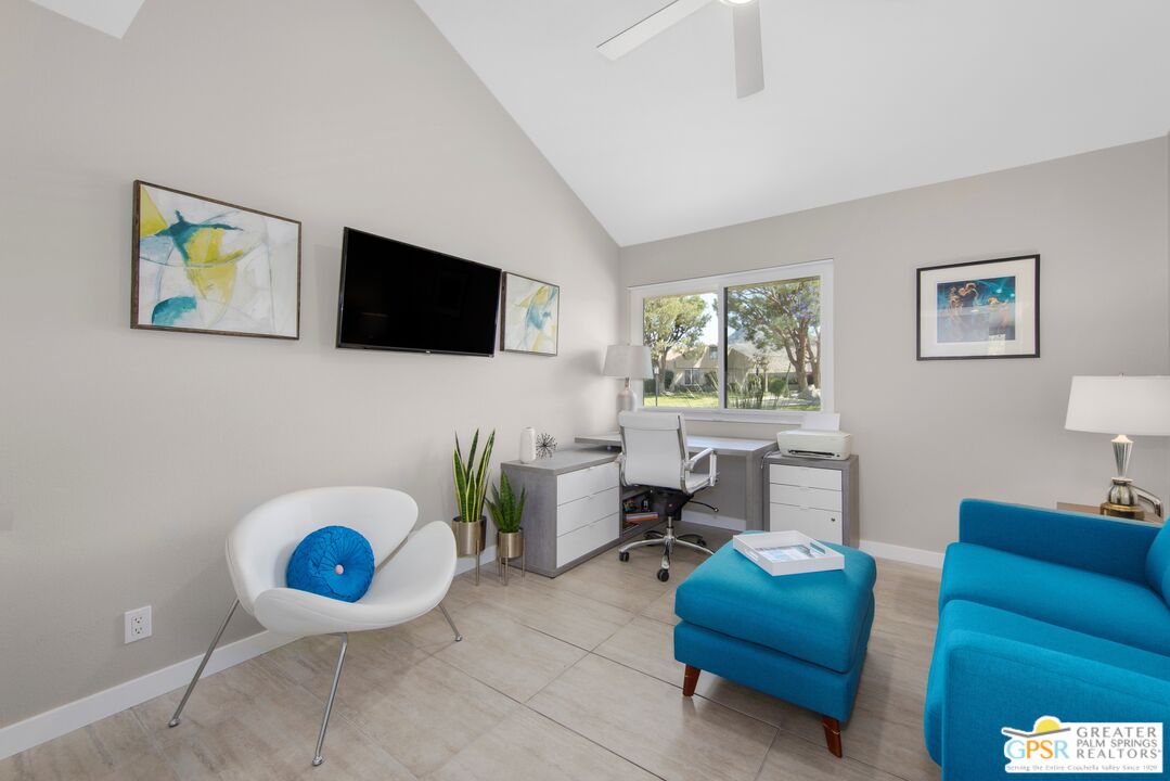36022 Paseo Circulo West Cathedral City, CA 92234 - Photo 24 of 47 a living room with furniture and a flat screen tv
