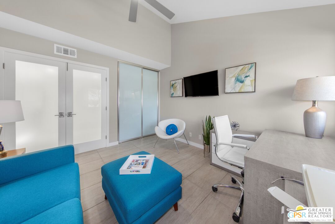 36022 Paseo Circulo West Cathedral City, CA 92234 - Photo 25 of 47 a living room with furniture and a flat screen tv