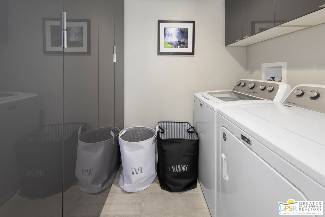 36022 Paseo Circulo West Cathedral City, CA 92234 - Photo 30 of 47 a utility room with dryer and washer
