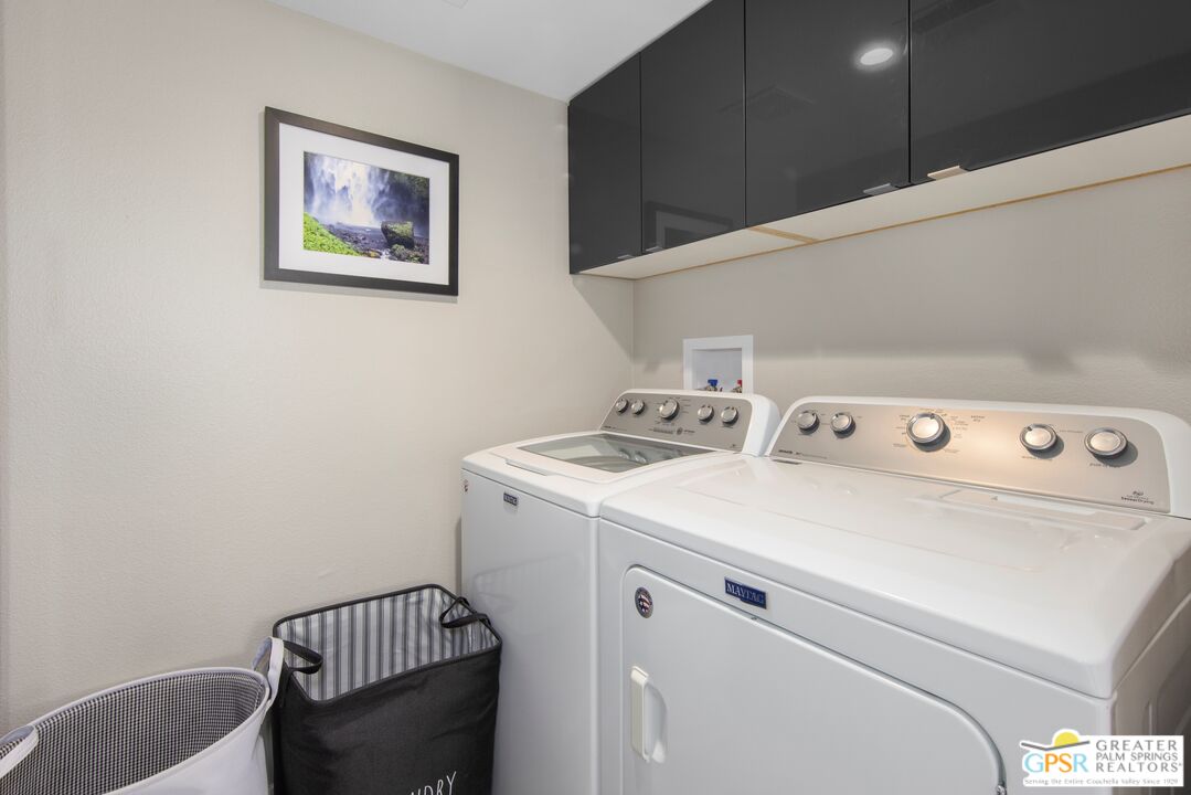 36022 Paseo Circulo West Cathedral City, CA 92234 - Photo 32 of 47 a utility room with dryer and washer