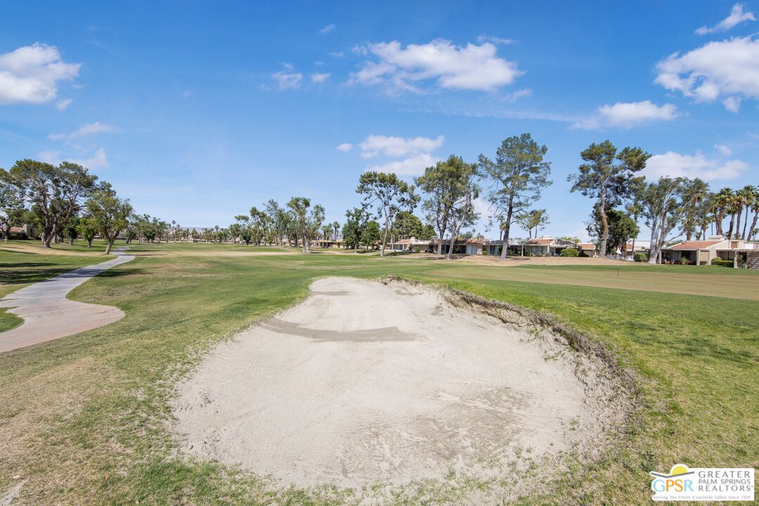 36022 Paseo Circulo West Cathedral City, CA 92234 - Photo 46 of 47 a view of a golf course with a lake