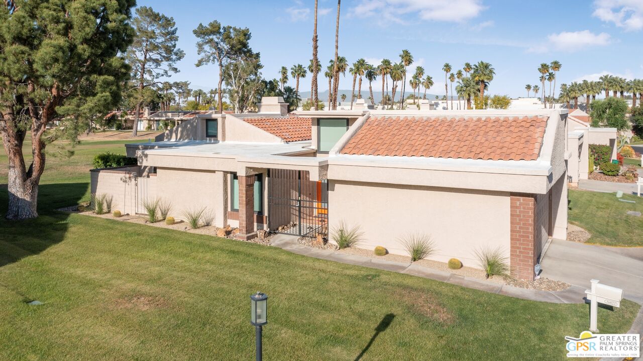 36022 Paseo Circulo West Cathedral City, CA 92234 - Photo 5 of 47 a view of swimming pool with a yard