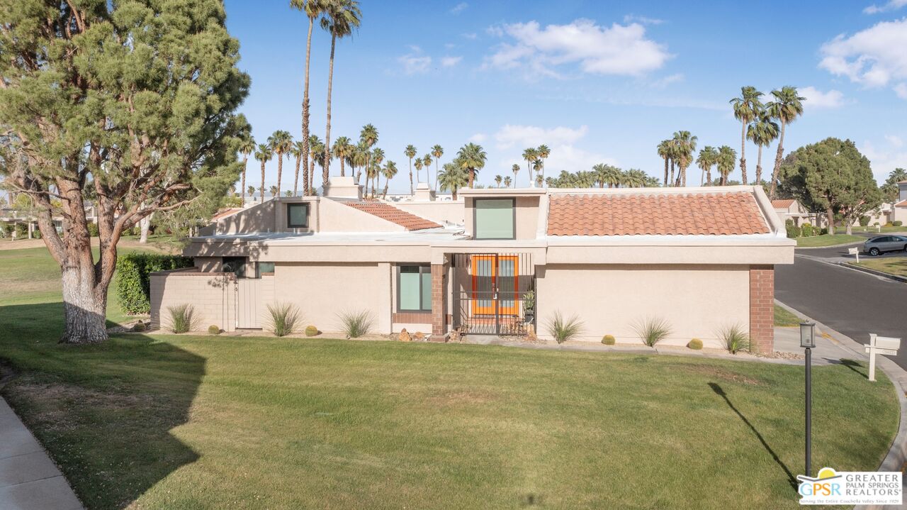 36022 Paseo Circulo West Cathedral City, CA 92234 - Photo 6 of 47 a front view of a house with a yard