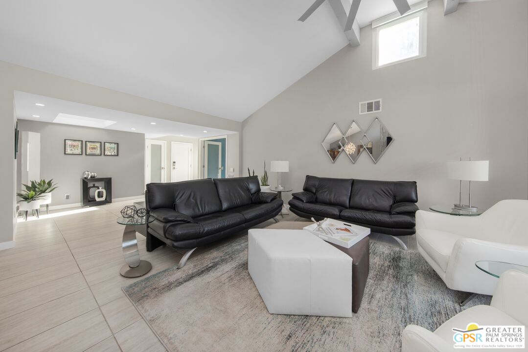 36022 Paseo Circulo West Cathedral City, CA 92234 - Photo 9 of 47 a living room with furniture and a window