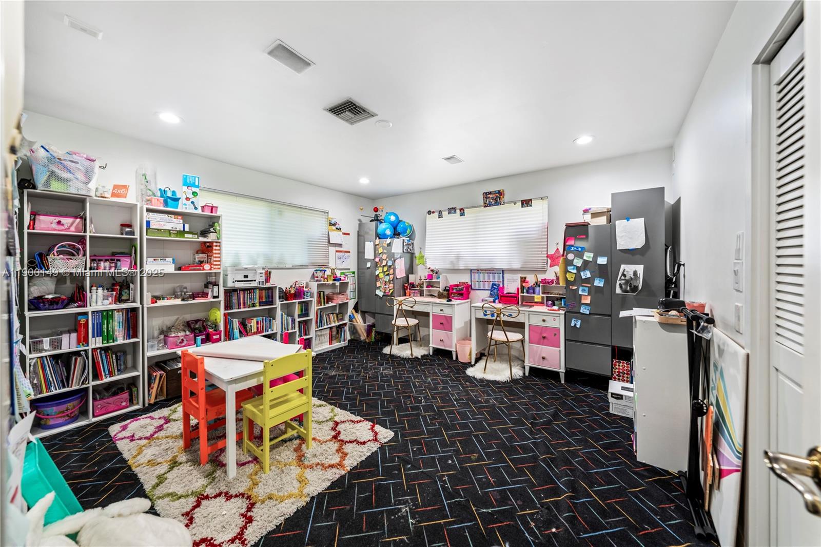 5820 Palm Tree Road Plantation, FL 33317 - Photo 15 of 23 a living room with lots of furniture and toys