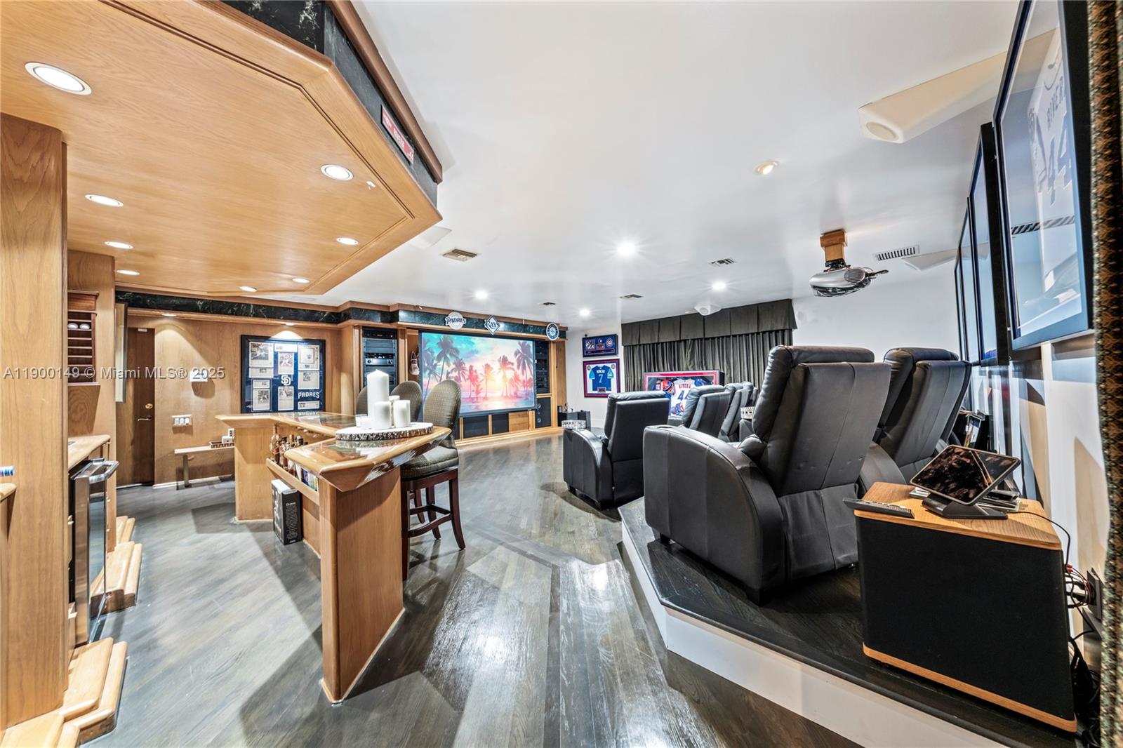 5820 Palm Tree Road Plantation, FL 33317 - Photo 2 of 23 a living room with furniture and a flat screen tv