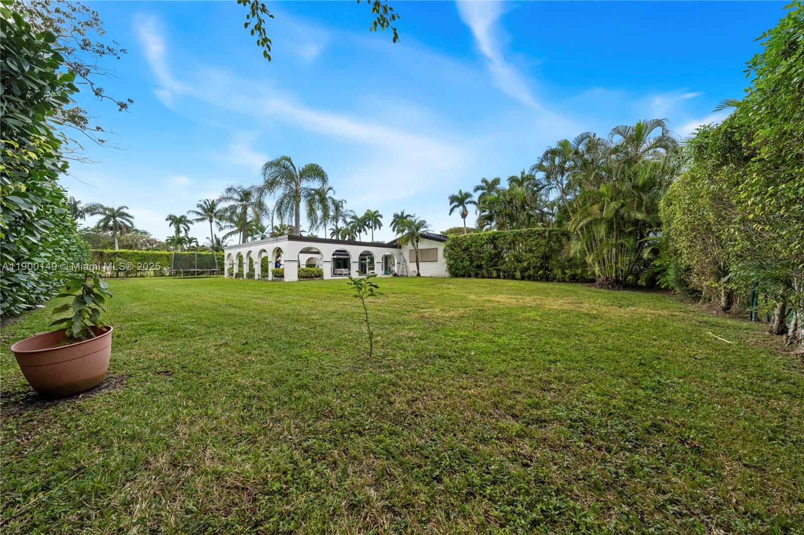 5820 Palm Tree Road Plantation, FL 33317 - Photo 21 of 23 a view of a garden with a slide