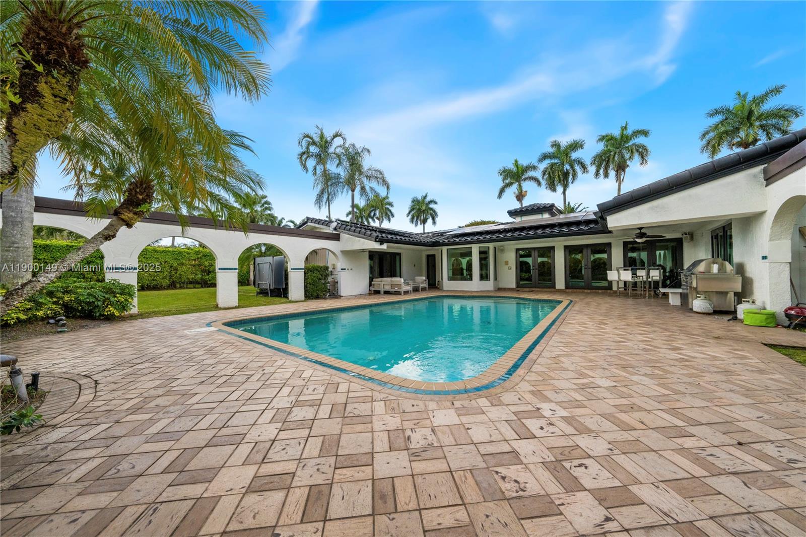 5820 Palm Tree Road Plantation, FL 33317 - Photo 23 of 23 a front view of house with yard and green space