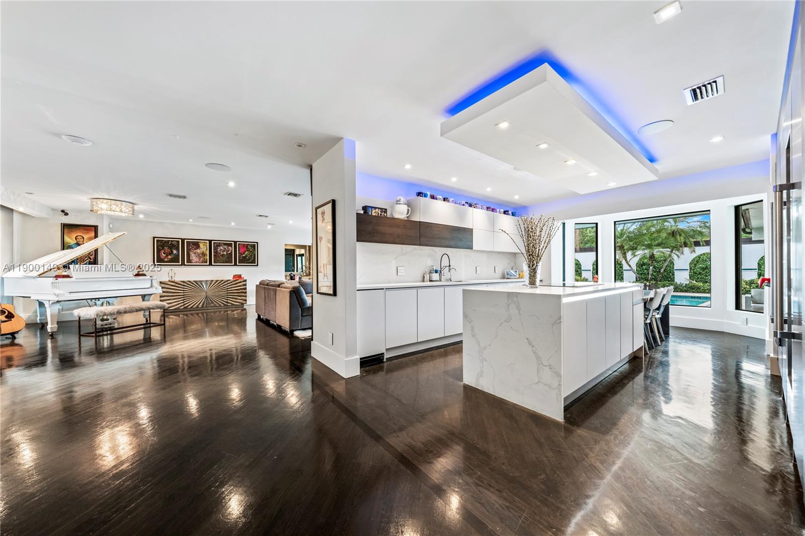 5820 Palm Tree Road Plantation, FL 33317 - Photo 3 of 23 a living room with furniture and a flat screen tv
