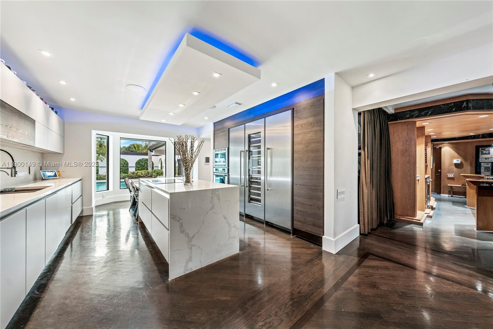 5820 Palm Tree Road Plantation, FL 33317 - Photo 4 of 23 a living room with furniture and large windows